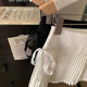 Korean sweet pleated skirt for women 2025 spring and summer new lace spliced ​​lace anti-exposure A-line skirt
