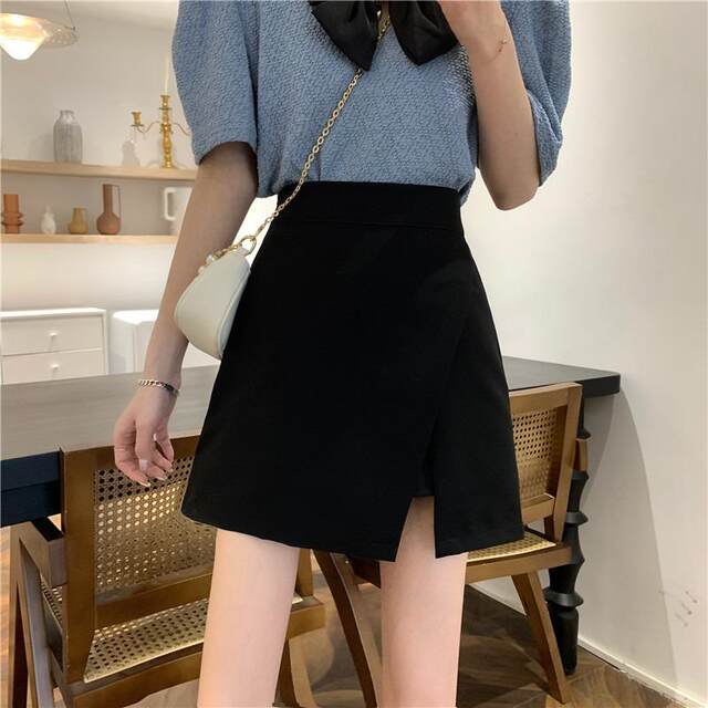 Irregular A -line suit skirt women's summer split skirt small black skirt new high -waisted short skirt bag hip skirt
