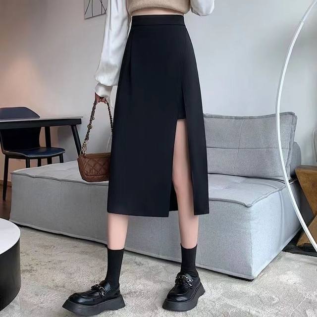 Pear-shaped body large size black fish bone skirt for women in spring and summer 2025 new fat mm waist-hugging a-line hip-packing umbrella skirt
