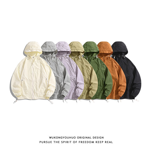 Wukong has a stock summer thin light and breathable sunscreen jacket for men and women fashion brand couples UV skin clothing