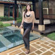 Swimsuit women's long -sleeved skirt -style Bikini four -piece shot shot from the seaside hot spring vacation large size slightly fat MM cover meat
