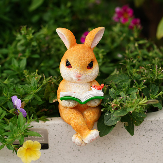 Cartoon rabbit reading a book, TV cabinet ornament flower pot decorate garden courtyard decoration landscape