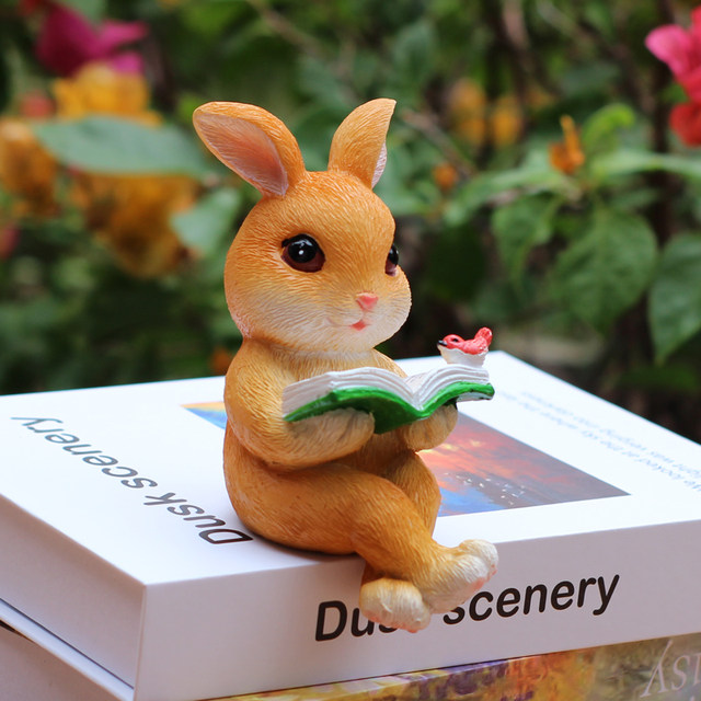 Cartoon rabbit reading a book, TV cabinet ornament flower pot decorate garden courtyard decoration landscape