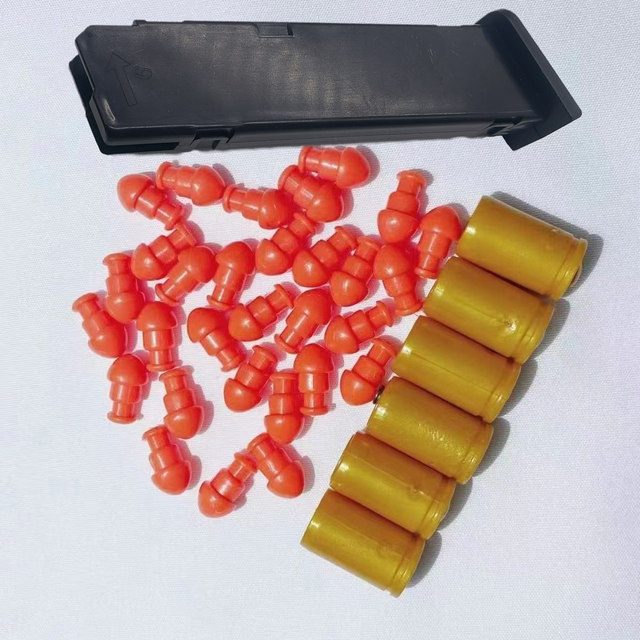 Semi -automatic Glock pistol soft bullet shell accessories connected ...