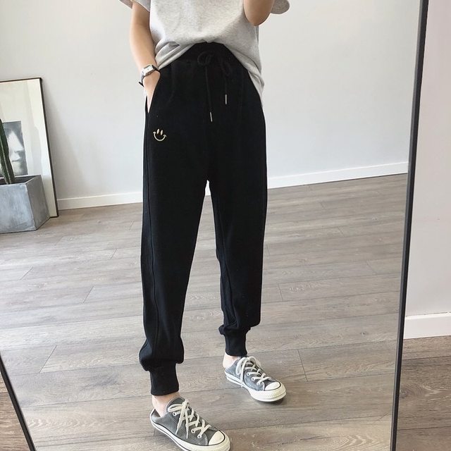 Large size smiley face embroidered loose sports trousers for women in autumn and winter new style 200Jin [Jin equals 0.5 kg] slimming legs Harun casual trousers