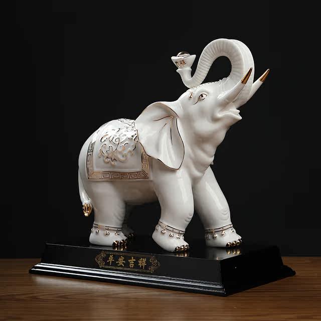 Chinese white ceramic elephant ornaments, a pair of high-end housewarming and opening gifts, living room wine cabinet, desktop fortune-enhancing decorations