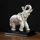 Chinese white ceramic elephant ornaments, a pair of high-end housewarming and opening gifts, living room wine cabinet, desktop fortune-enhancing decorations