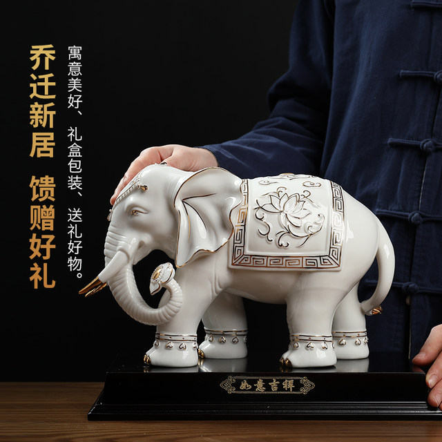 Chinese white ceramic elephant ornaments, a pair of high-end housewarming and opening gifts, living room wine cabinet, desktop fortune-enhancing decorations