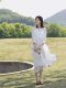 Literary retro white women's mid -length skirt new model seven -point sleeve pure color ramie crushing pleated loose large dressing dress
