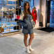Spot KSUBI high waist light blue cotton asymmetrical breasted slim high legs long wrap mini denim skirt