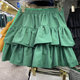 2025 new fluffy skirt short skirt solid color high-waisted skirt ruffled A-line skirt versatile to make you look slim and cover your flesh casually
