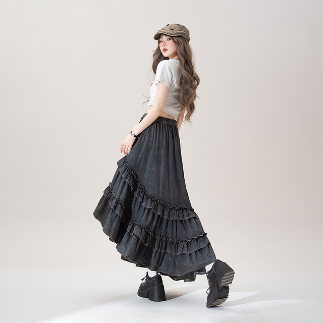 Black elastic waist ruffled spliced ​​denim skirt for women in summer new small irregular A-line long skirt