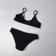 Amber single children's split swimsuit girls pure black pit strip triangle bikini hot spring beach kids
