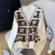 Loose, thin, fake, two semi -high -necked knitted jacket women's winter foreign gas reduction thickened sweater