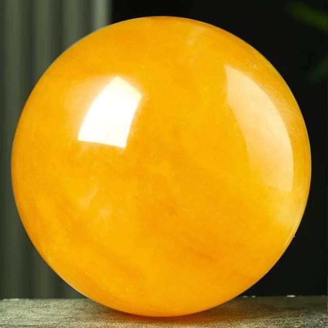 
High-end natural yellow crystal ornaments True water raw stone ball kitchen office entrance flowing water high-end crystal ball natural