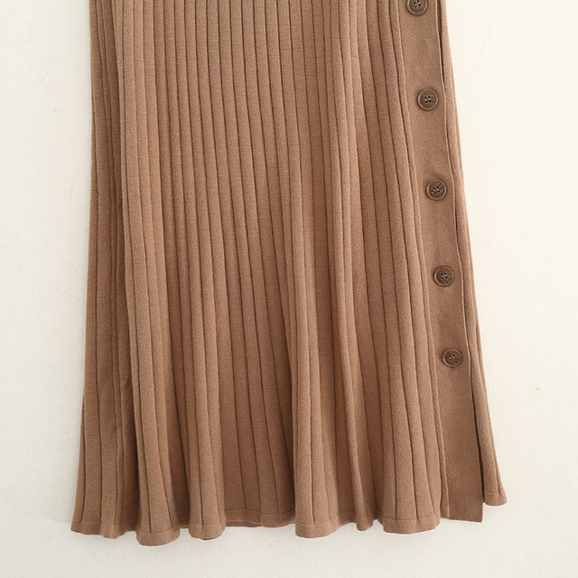 Spring and Autumn Pit knitted half skirt solid color button decoration simple temperament medium long A -line skirt outer single -tail cargo women's clothing