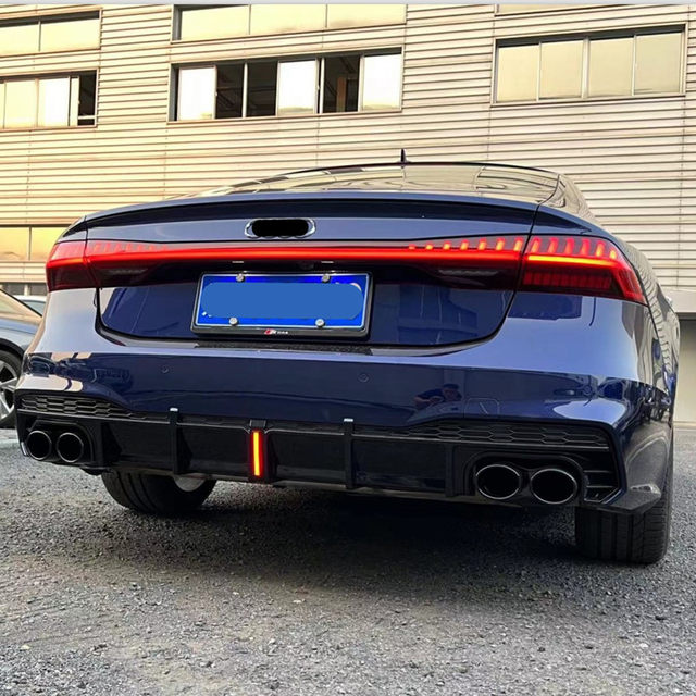 Suitable for 19-25 Audi A7 modified S7 four-out exhaust tail throat a7l rear tail lip with navigation light rear surround