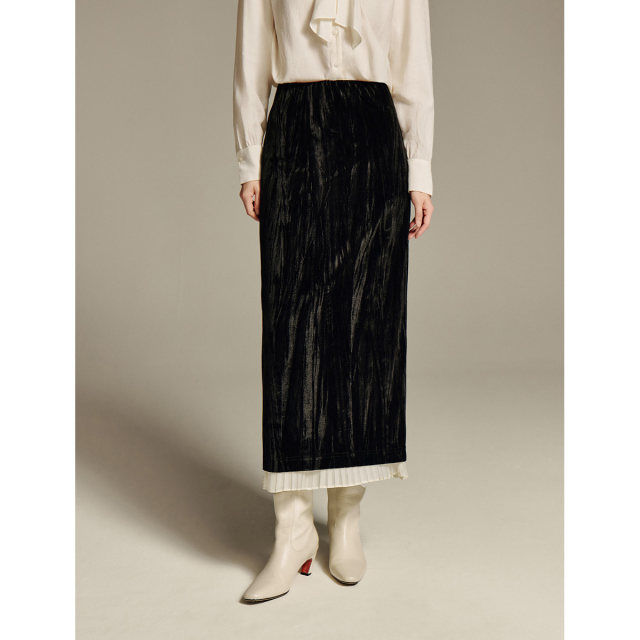 Inman velvet spliced ​​press-pleated hem skirt 2025 spring women's new high-waisted slim A-line long skirt
