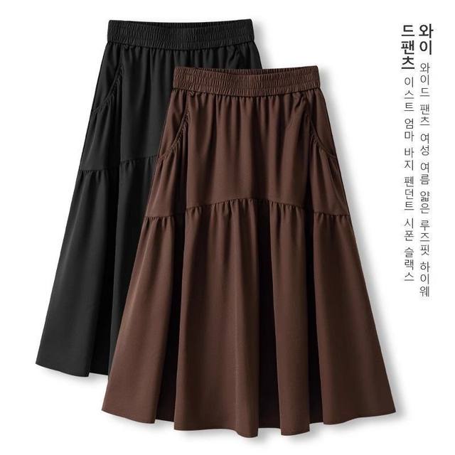 Pocket skirt 2025 summer black new skirt for women with high waist slim high-end versatile umbrella skirt mid-length