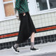 Black irregular skirt female autumn mid -length loose large -size pocket high -waist French retro A -line long skirt
