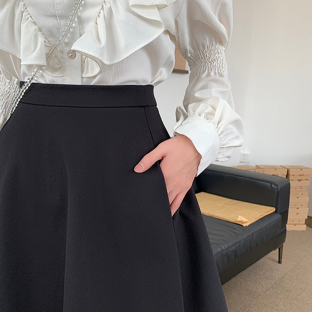 Boxer skirt female black suit umbrella skirt pocket vertical A -line skirt large size fluffy pleated skirt anti -light skirt
