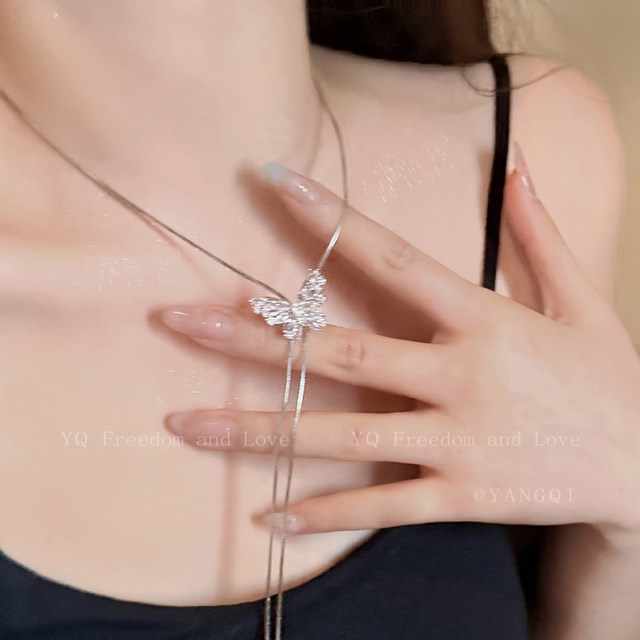 Silver butterfly long necklace women's autumn and winter new decorative sweater chain clavicle chain light luxury niche high-end accessories