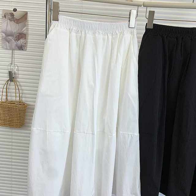 2024 Summer new loose waist cocoon large skirt puffy skirt medium long thin pocket leisure half skirt female