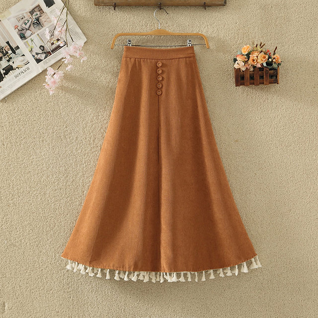 Retro corduroy skirt for women in autumn and winter new high-waisted slim button decorative tassel large a-line sling umbrella skirt
