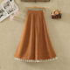 Retro corduroy skirt for women in autumn and winter new high-waisted slim button decorative tassel large a-line sling umbrella skirt