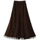 Retro corduroy skirt for women in autumn and winter new high-waisted slim button decorative tassel large a-line sling umbrella skirt