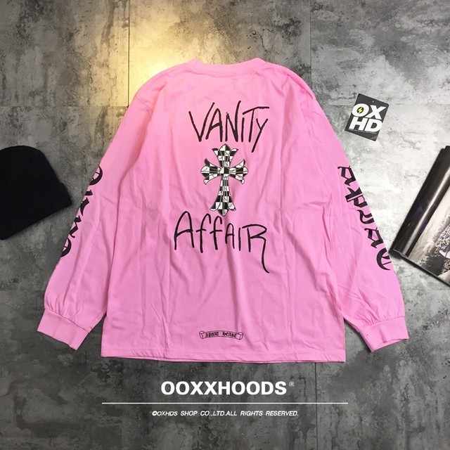 2023 new autumn and winter pink printed arm pockets decorated with cross loose oversize off-shoulder long-sleeved T-shirt