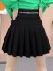 Black pleated short skirt new autumn and winter design sense large size fat girl letters abdomen elastic high waist A-line skirt