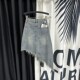 Irregular breasted retro denim skirt for women 2025 summer new high waist oblique design A-line midi skirt