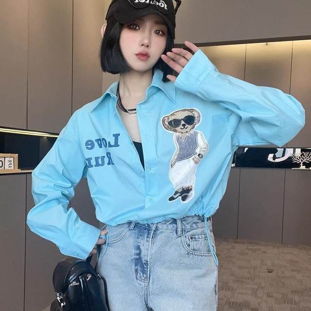 Long-sleeved shirt for women 2025 spring new contrasting color splicing cartoon cartoon letters loose single-breasted lapel top
