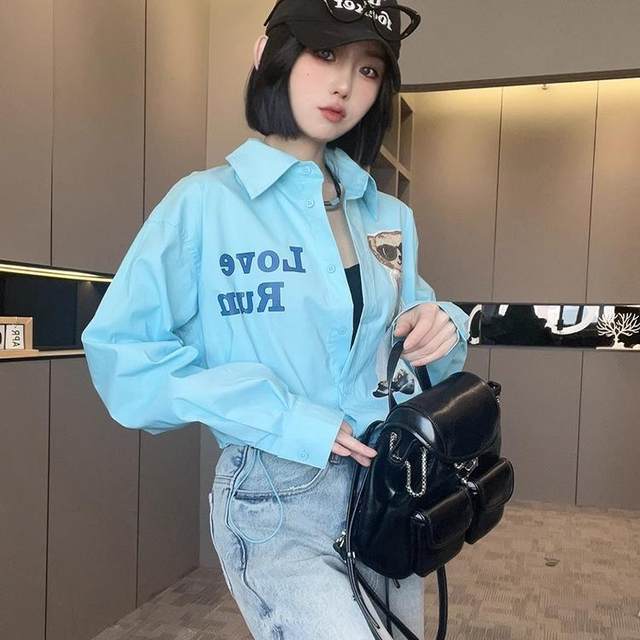 Long-sleeved shirt for women 2025 spring new contrasting color splicing cartoon cartoon letters loose single-breasted lapel top
