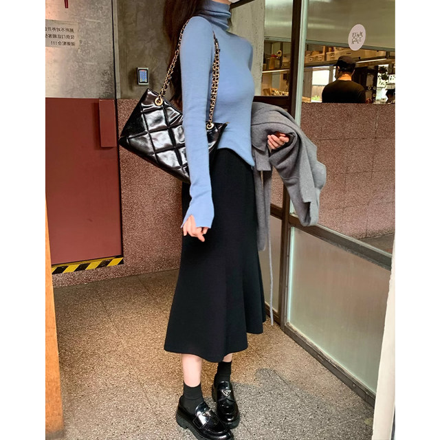 Pregnant women skirts women's spring and autumn and winter mid -length black pregnancy A -line knitted hip skirt one -step skirt
