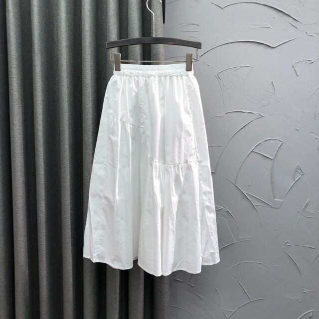 Korean style white elastic waist casual splicing skirt for women in summer fashion loose and fashionable A-line large sway midi skirt