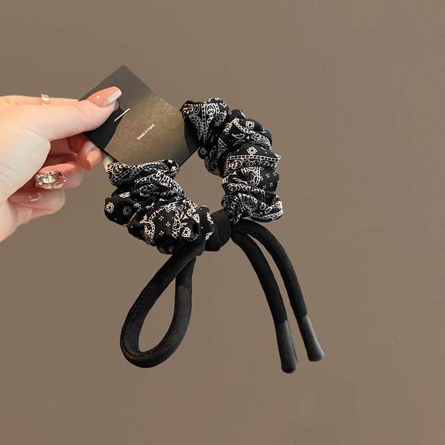 
Retro pattern black small intestine circle high-end texture hair rope headwear 2025 new bow knot ponytail headband