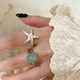 Unpopular seaside starfish open ring women's niche design exaggerated decorative index finger ring light luxury high-end accessories