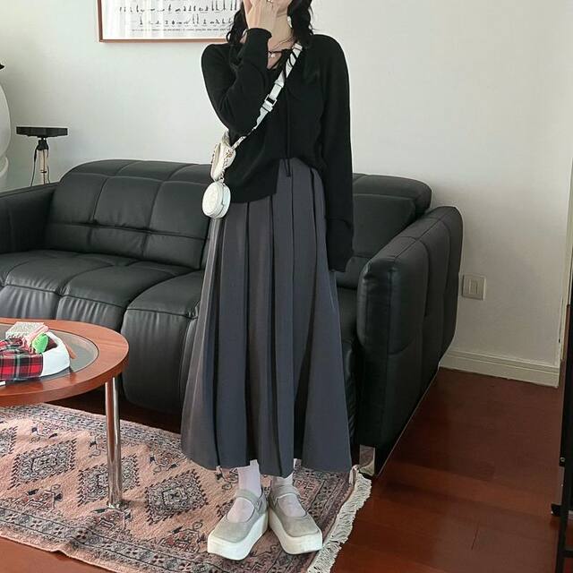 Western temperament high -level vertical pressure pleated suits skirt women autumn and winter retro, big cover leisure A -shaped half body long skirt
