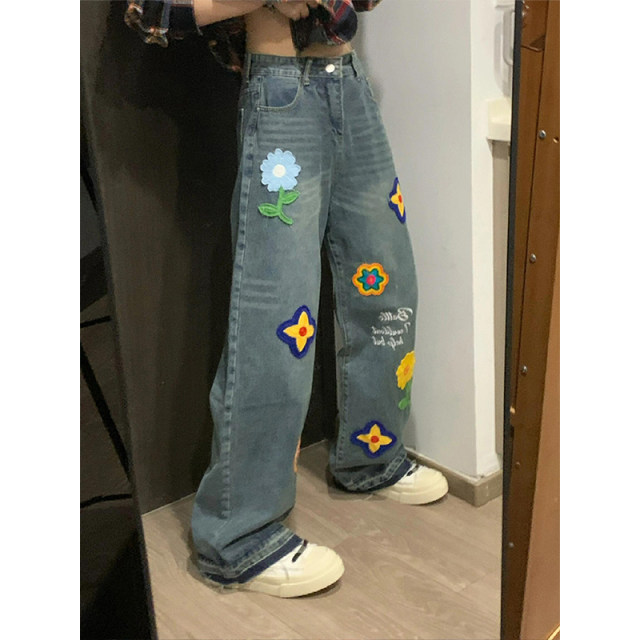 Fat mm large size women's cartoon jeans women's design feel embroidered pants fried street wild pants thin leg pants