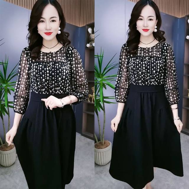 2025 early spring new style slim waist-hugging spliced ​​printed round neck mid-length skirt