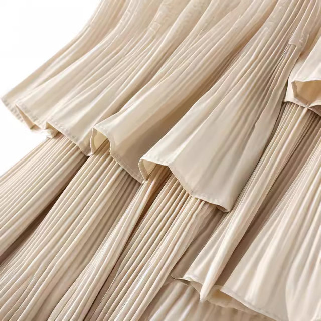 Autumn and winter Korean version of asymmetric pleated cake skirt for women versatile mid-length lotus irregular skirt