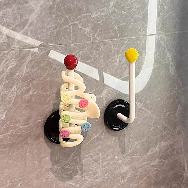 The bathroom hair hoop hair rope storage shelf wall new wall -mounted jewelry hair jewelry hair clip coat band head rope hook
