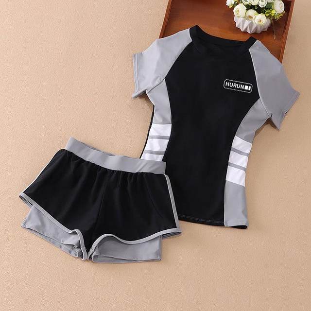 Girls' swimsuit split short -sleeved sunscreen Daedong children's flat -angle trousers, children's fast dry two -piece student swimsuit