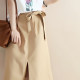 Japanese style skirt for women in summer 2025 new high-waisted retro slit lace-up slim camel a-line midi skirt