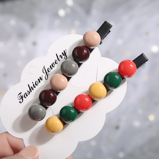 A clip of a clip a simple candy -colored side large hair circular bead retro color net red clip headdress headgear
