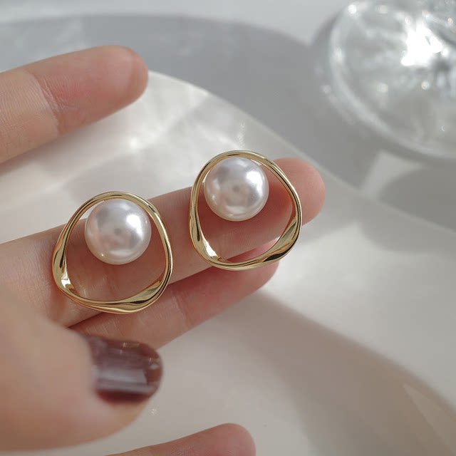 Champs Elysees without ear piercing French retro mosquito coil disc ear clip round face showing small temperament design high-end