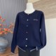 Autumn new knitted cardigan mother's fashion fashionable top button long-sleeved middle-aged women's versatile coat sweater