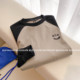KLFOLLOW embroidered smiley face inserted shoulder sleeves stitching loose long -sleeved T -shirts spring and autumn oversize couple European and American tide
